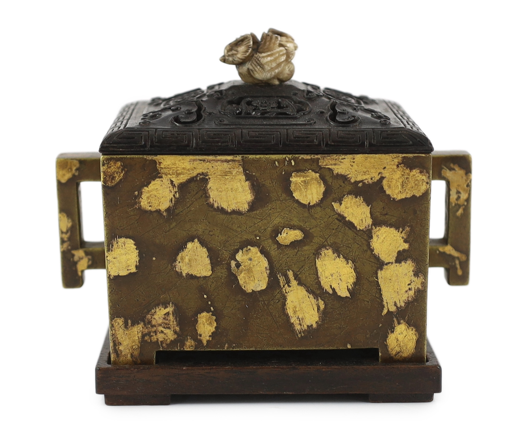 A Chinese gold splashed bronze censer, fangding, wood cover and stand